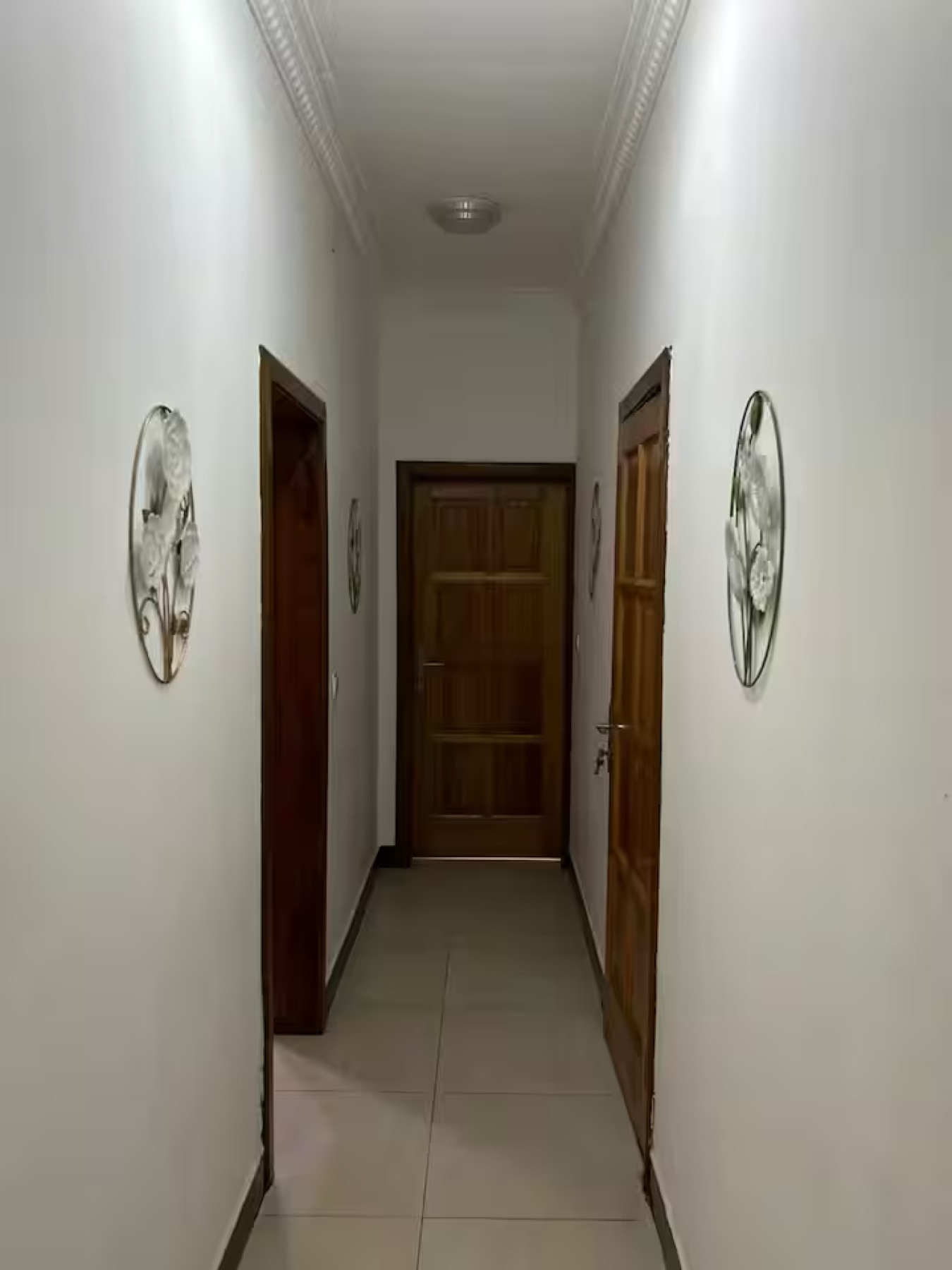 Le couloir desservant les chambres
